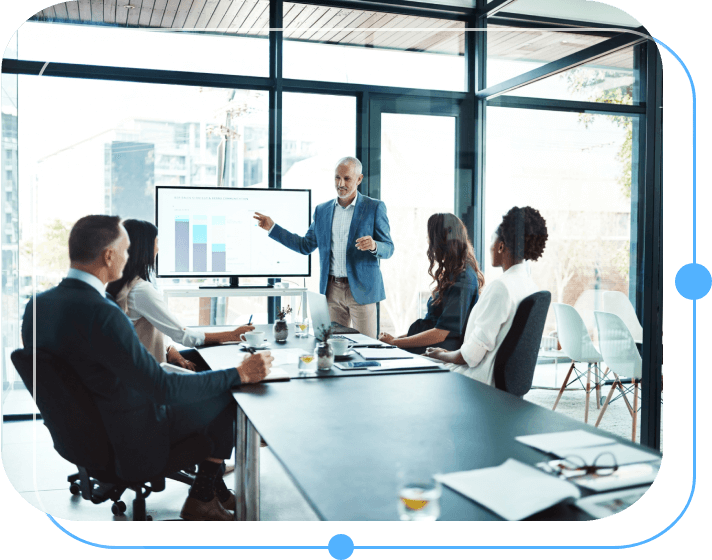 A group of people in a conference room.